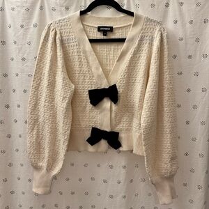 Express Cream Cardigan with Black Bow Details